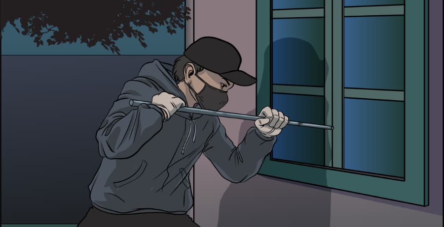 Illustration of burglar forcing entry through a window in Chattanooga